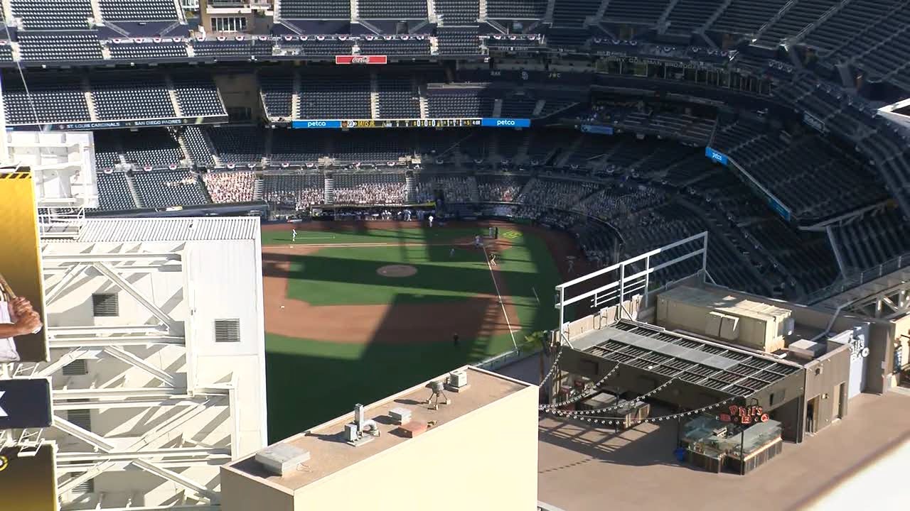 Padres fans gather on roof of Marriott Gaslamp Quarter to watch postseason game